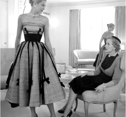 Grace Kelly with her mother, Margaret Kelly, trying a dress